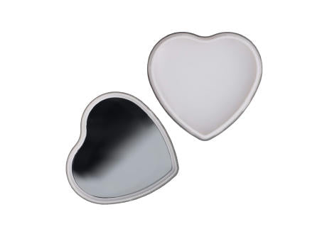 Lippenbalsam in Flacher metallischer Herzformdose