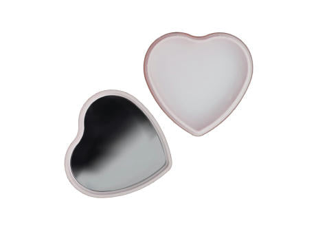 Lippenbalsam in Flacher metallischer Herzformdose