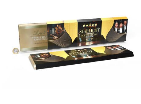 Lindt Alpenvollmilch Extra Tafel im Werbeschuber