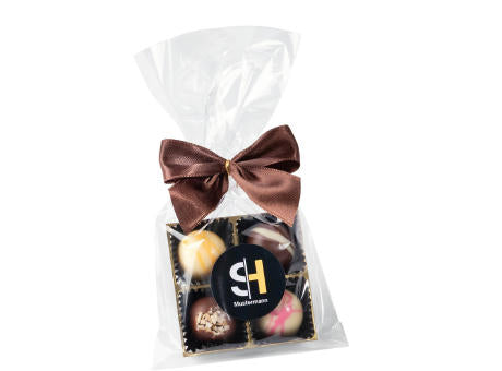 4 PREMIUM-PRALINEN IN TÜTE MIT SCHLEIFE